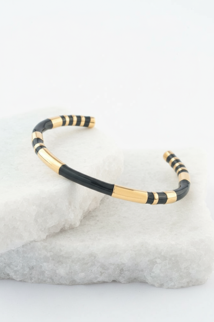 Radiate Hope Cuff in Black with Ivory background